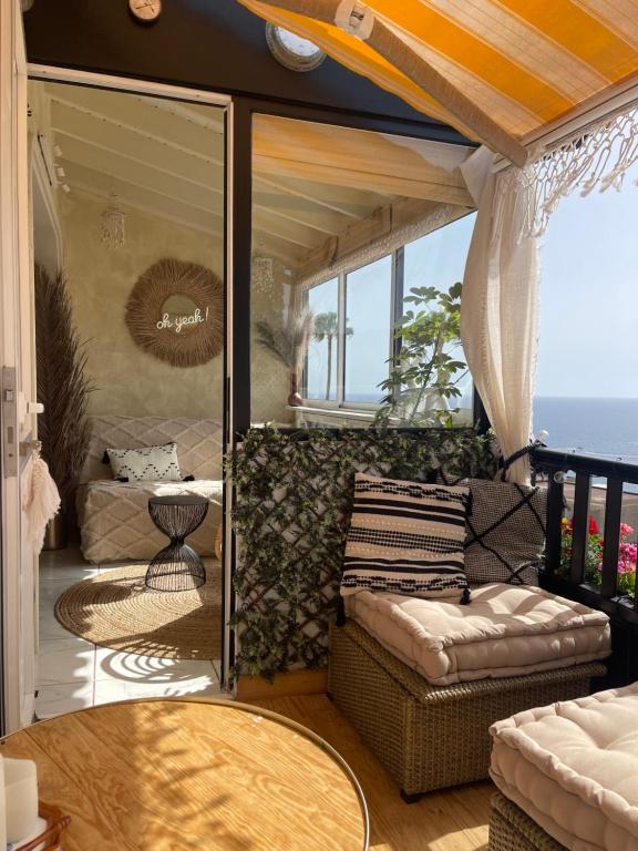 Posezení v ubytování Boho style bungalow with ocean view