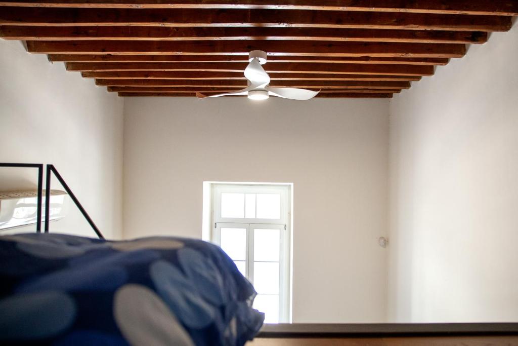 Postel nebo postele na pokoji v ubytování MeMeraki Artist Residency