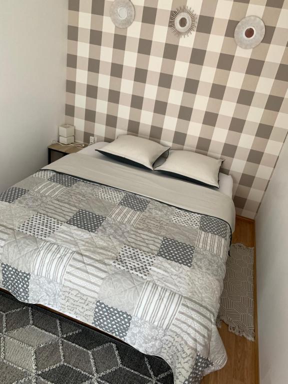 Postel nebo postele na pokoji v ubytování Studio indépendant Lisieux