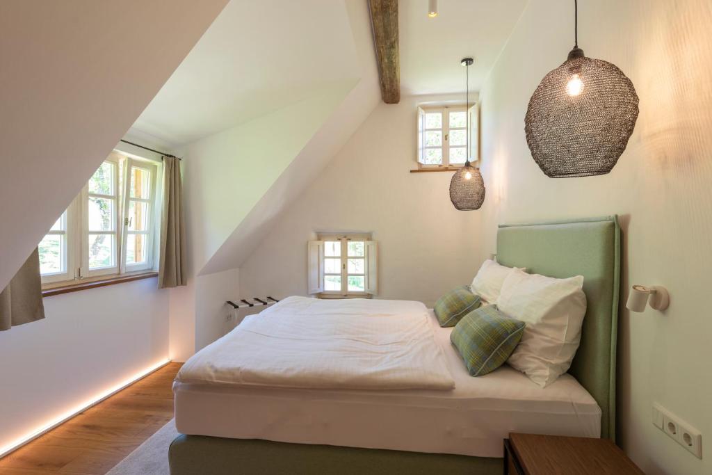 Postel nebo postele na pokoji v ubytování Landhaus Obersteinriegl