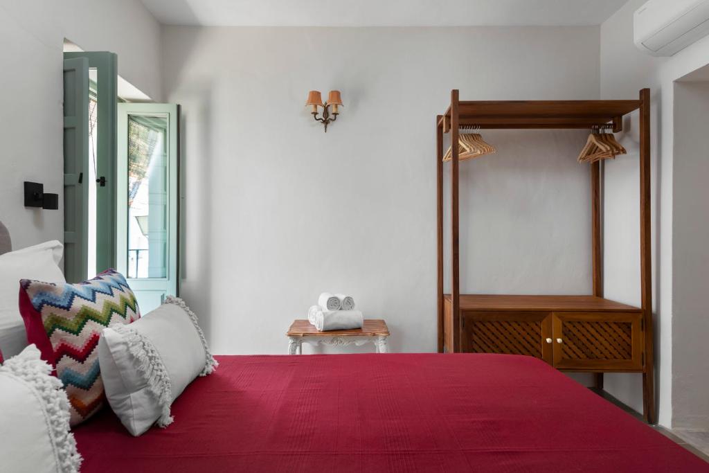 Łóżko lub łóżka w pokoju w obiekcie La AMARA Maha - en el casco antiguo de Frigiliana