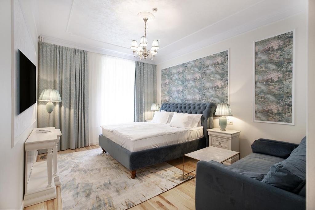 Postel nebo postele na pokoji v ubytování Hotel Caraiman