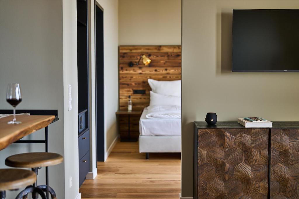 Postel nebo postele na pokoji v ubytování FREIgeist Homes - Serviced Apartments