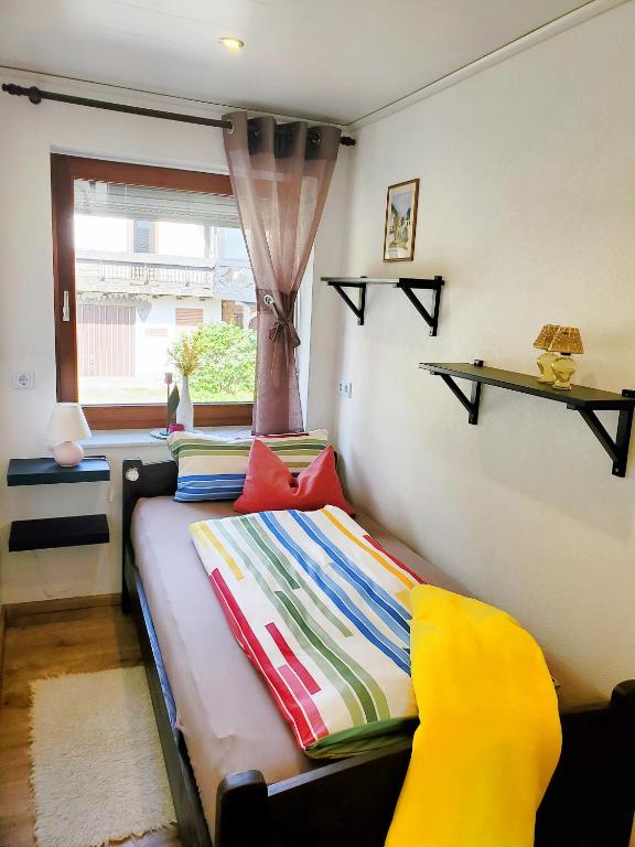 Postel nebo postele na pokoji v ubytování Ferienwohnung Sonnenblick