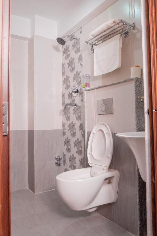 Koupelna v ubytování Madhuban Hotel