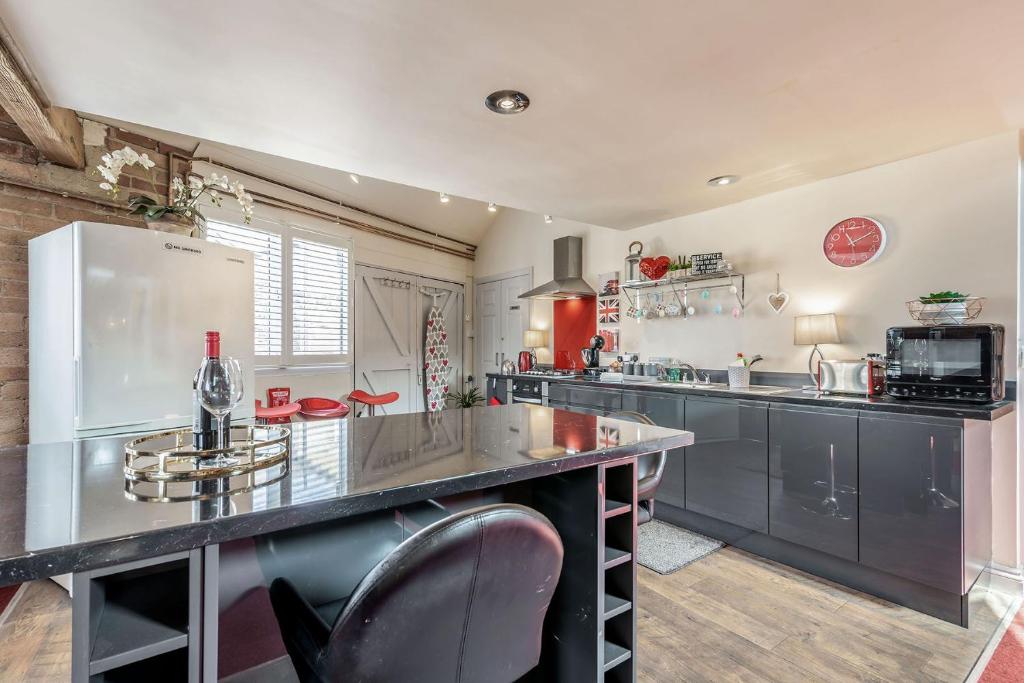 Kuchyň nebo kuchyňský kout v ubytování Dragon Loft Apartment