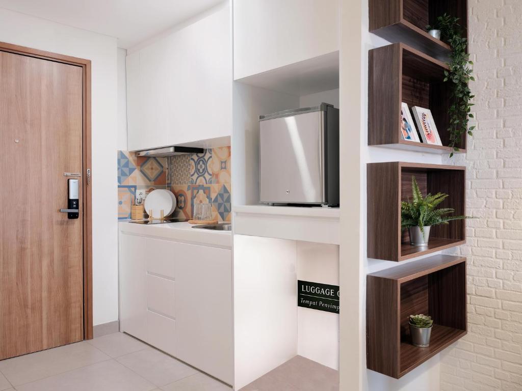Kuchyň nebo kuchyňský kout v ubytování Fika Rooms Tangerang By Skandinavia