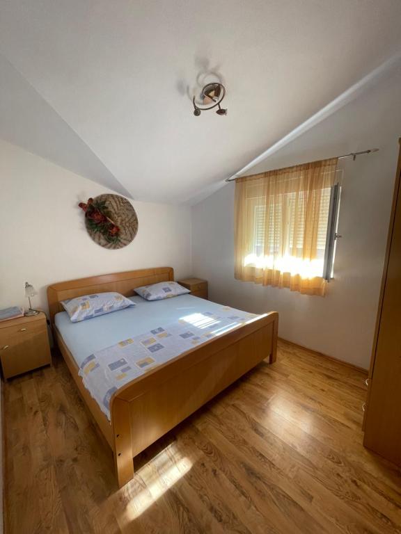 Postel nebo postele na pokoji v ubytování Apartman Jukic