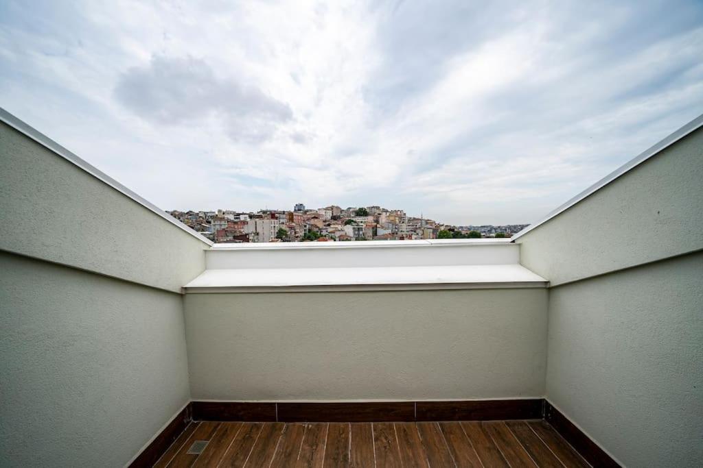 an empty room with a view of a city at Superior, classy residence,7&#47;24 Security,2 bedroom ( Benesta 205 ) in Istanbul