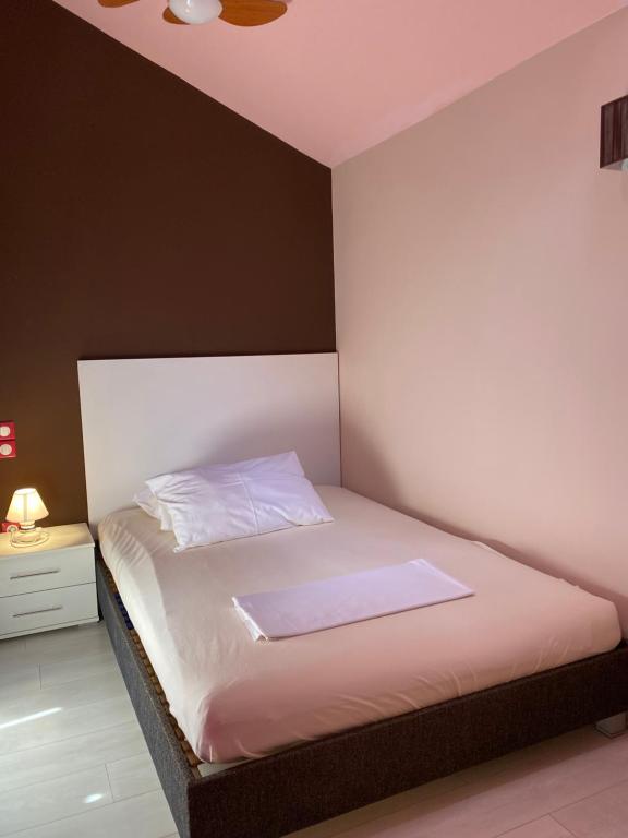 Postel nebo postele na pokoji v ubytování Apartments Ylona