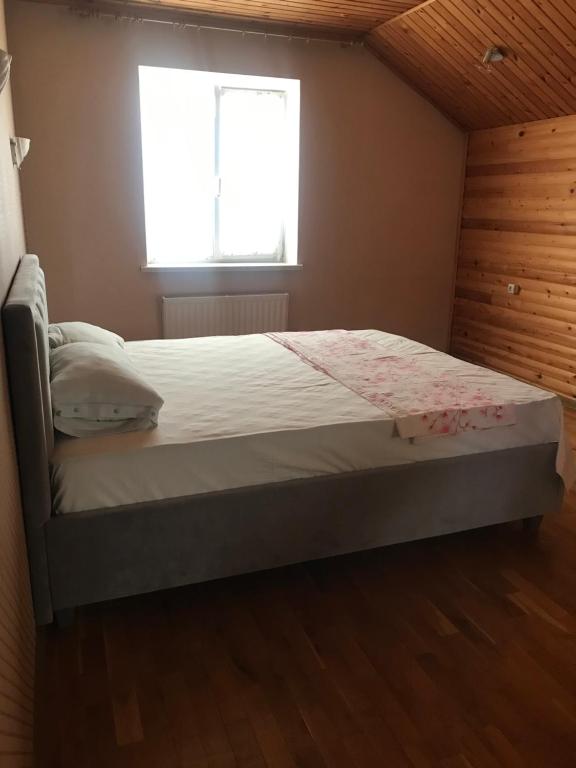 En eller flere senge i et værelse på Casa Centru Chișinău