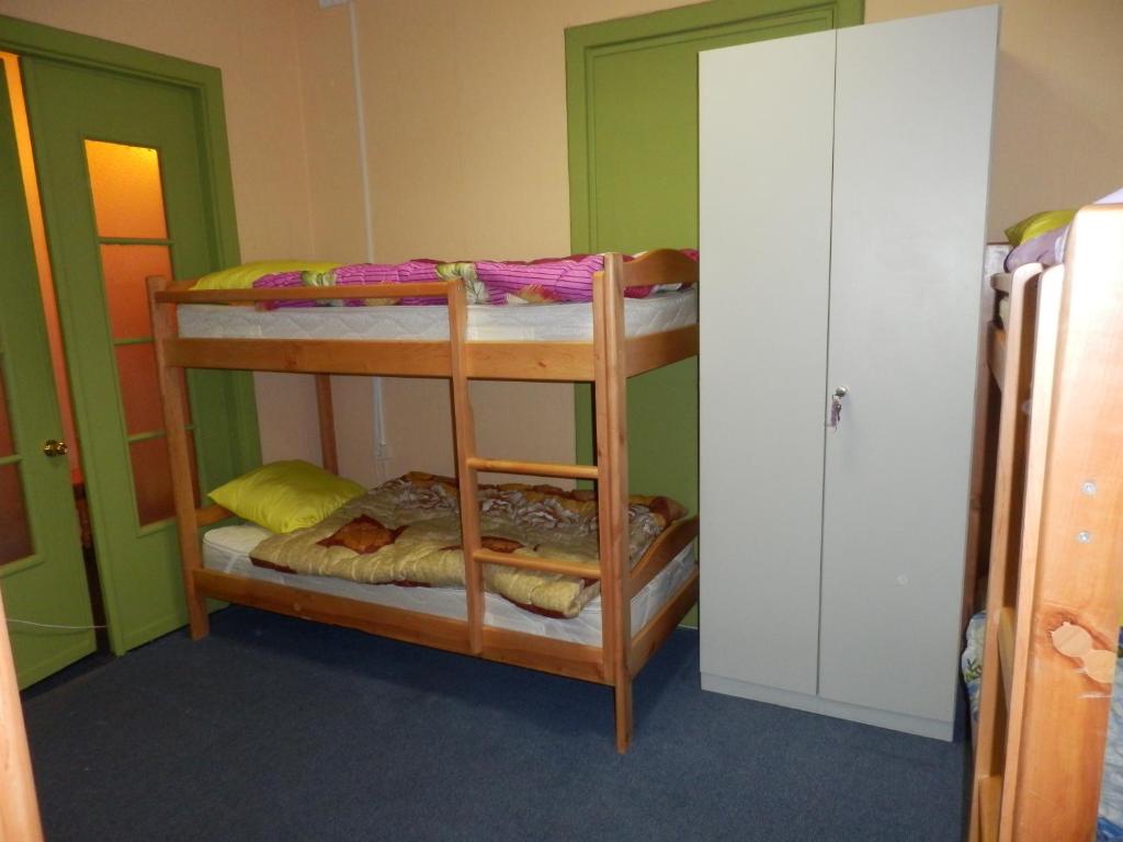 Postel nebo postele na pokoji v ubytování YourHostel Club