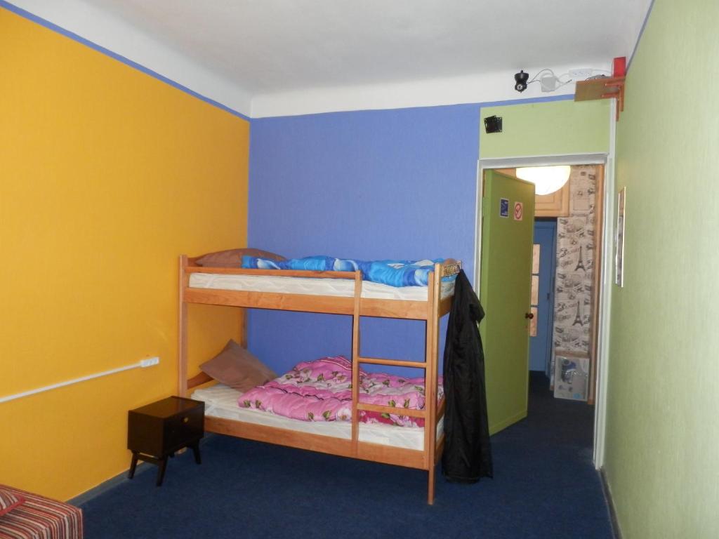Postel nebo postele na pokoji v ubytování YourHostel Club