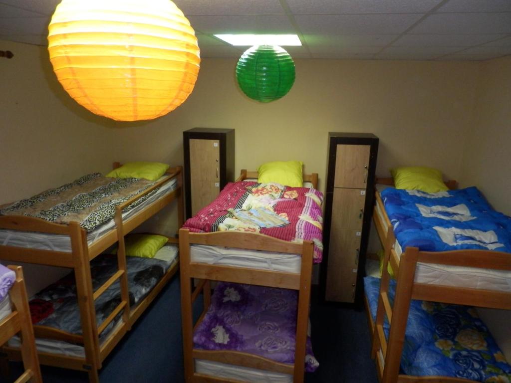 Postel nebo postele na pokoji v ubytování YourHostel Club