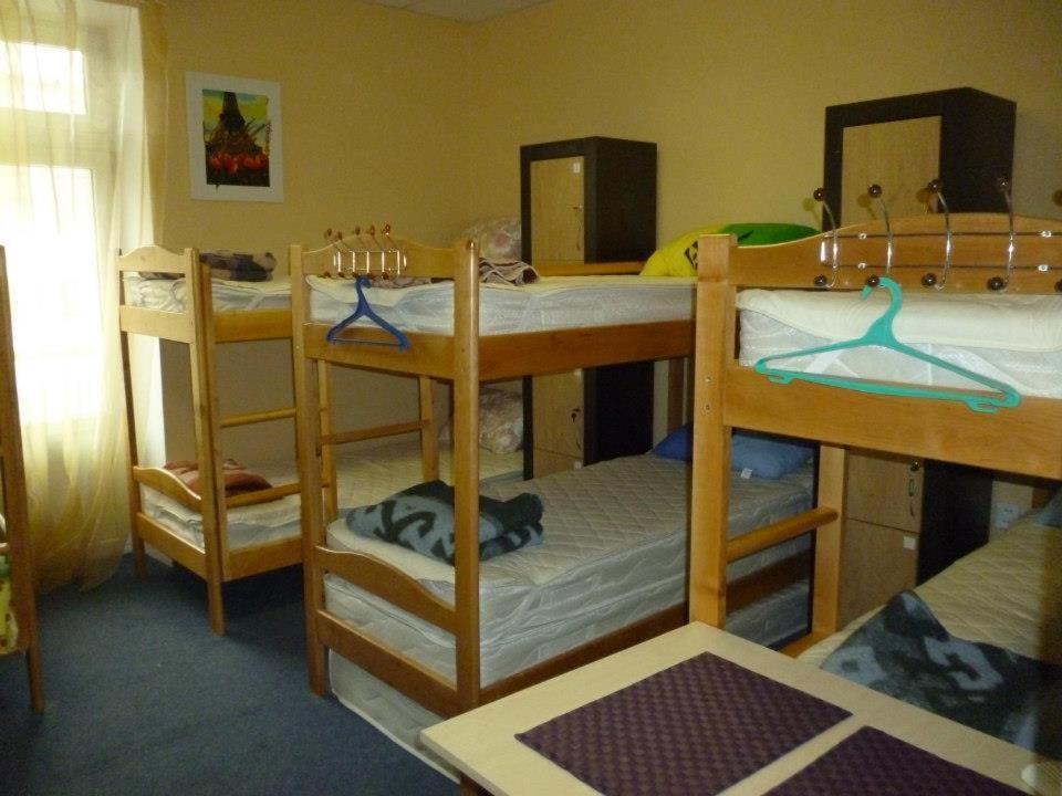 Postel nebo postele na pokoji v ubytování YourHostel Club