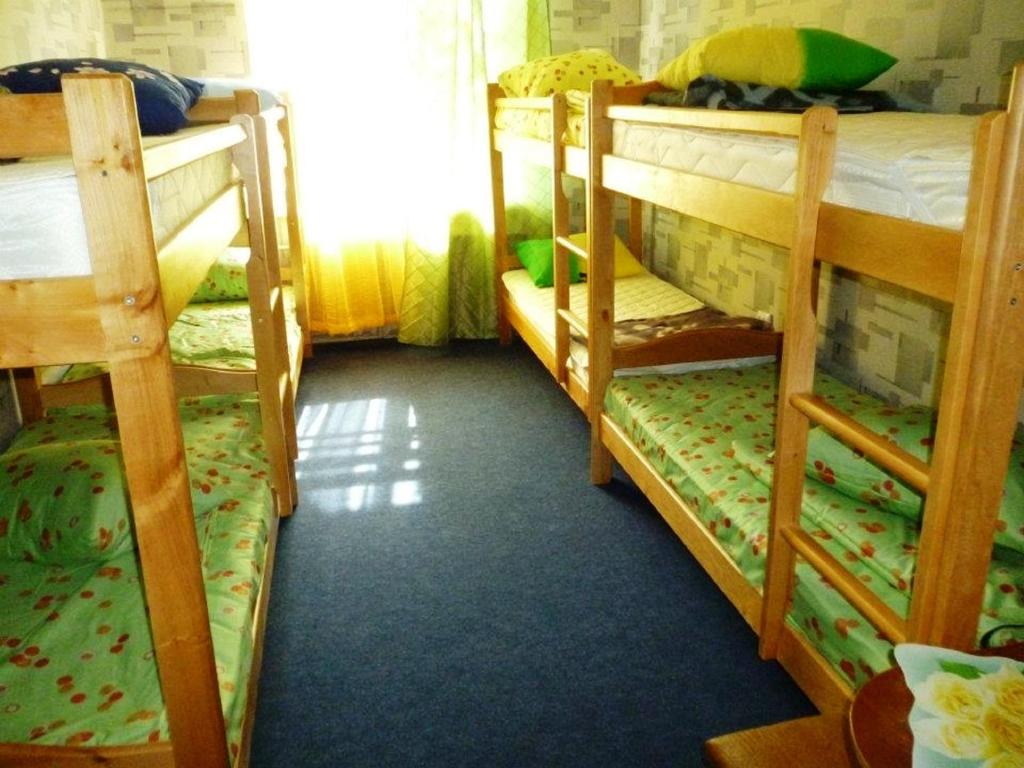 Postel nebo postele na pokoji v ubytování YourHostel Club