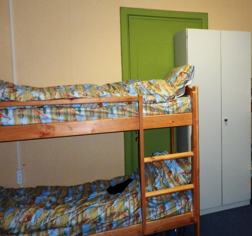 Postel nebo postele na pokoji v ubytování YourHostel Club