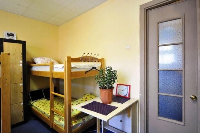 Postel nebo postele na pokoji v ubytování YourHostel Club