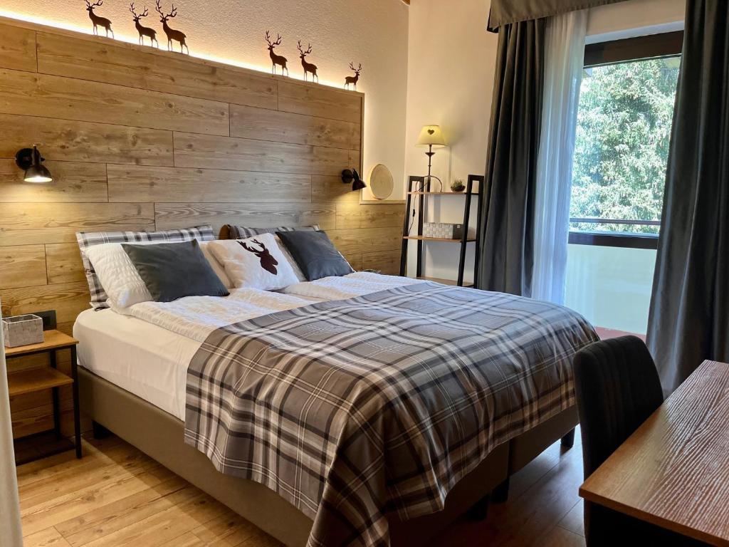 Postel nebo postele na pokoji v ubytování Hotel Derby