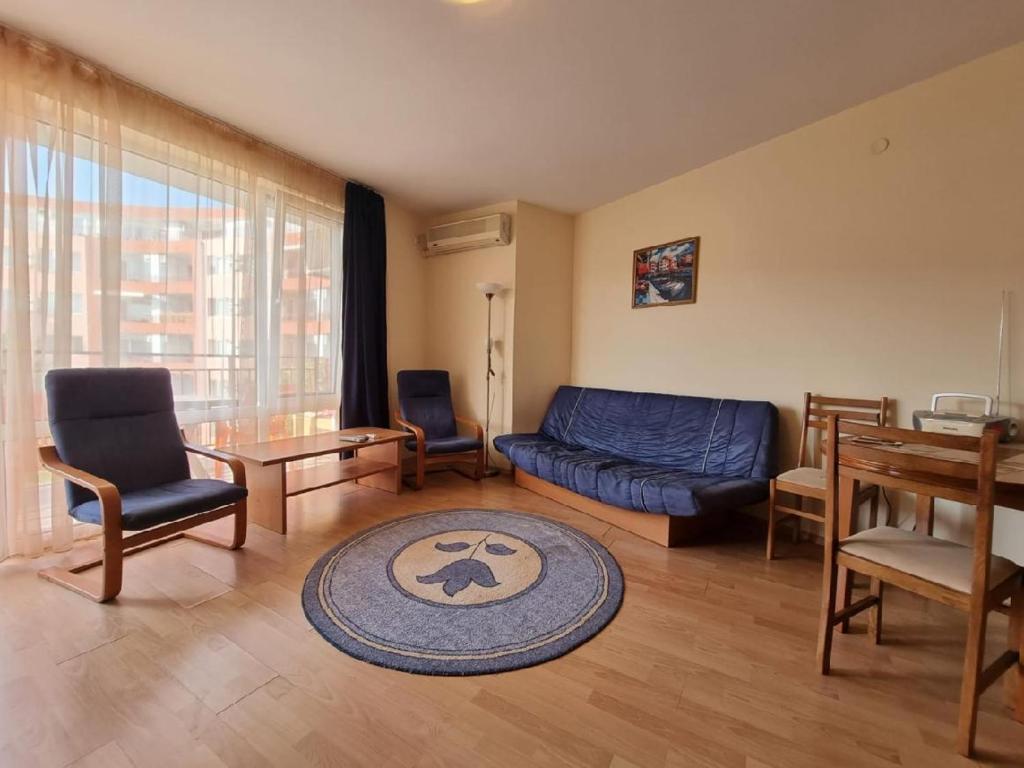 A seating area at Privilege Fort beach Apartman Sveti Vlas 61m2