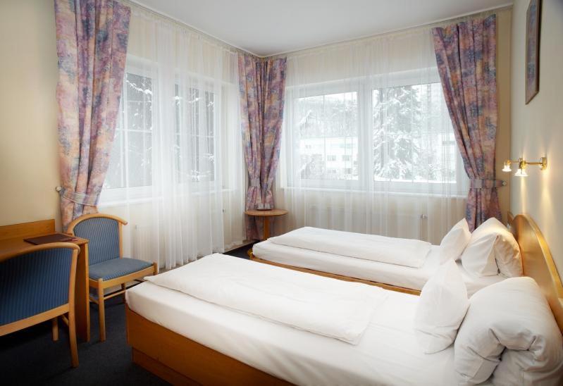 Postel nebo postele na pokoji v ubytování Pension Kern