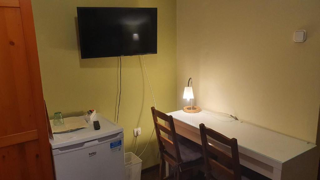A television and/or entertainment centre at Palantír Panzió