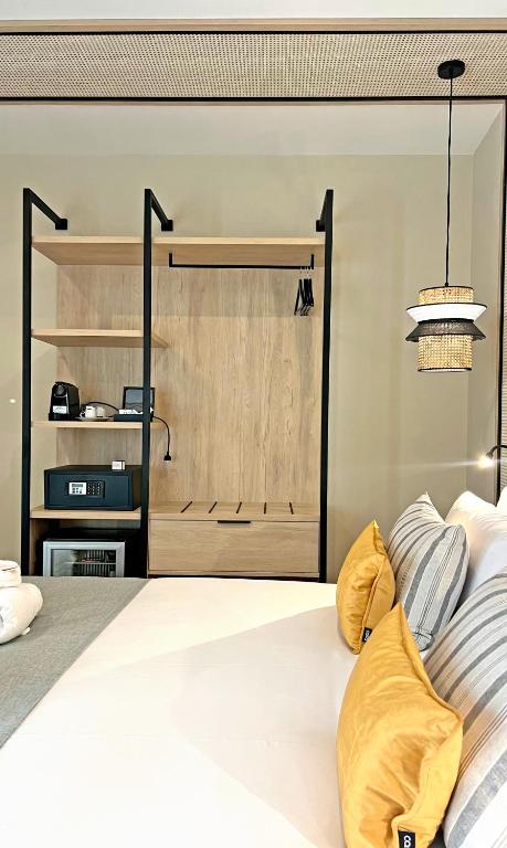 Postel nebo postele na pokoji v ubytování Soho Boutique Columela