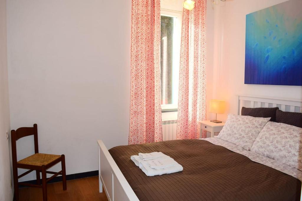 Postel nebo postele na pokoji v ubytování L'Oliveto dei Cinque Sensi