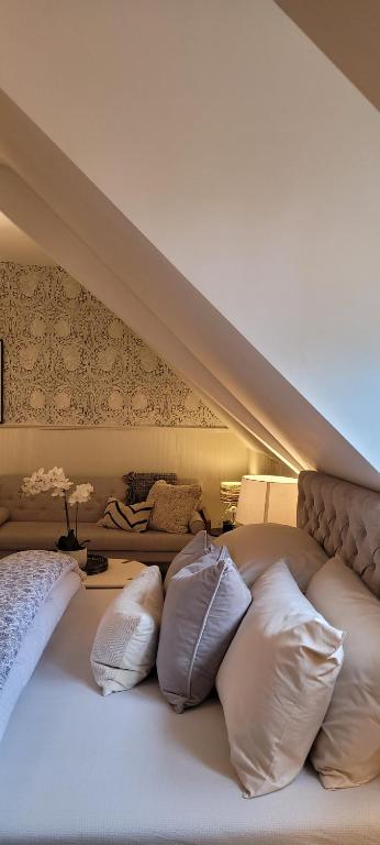 Postel nebo postele na pokoji v ubytování Rigsbys Guesthouse Doncaster