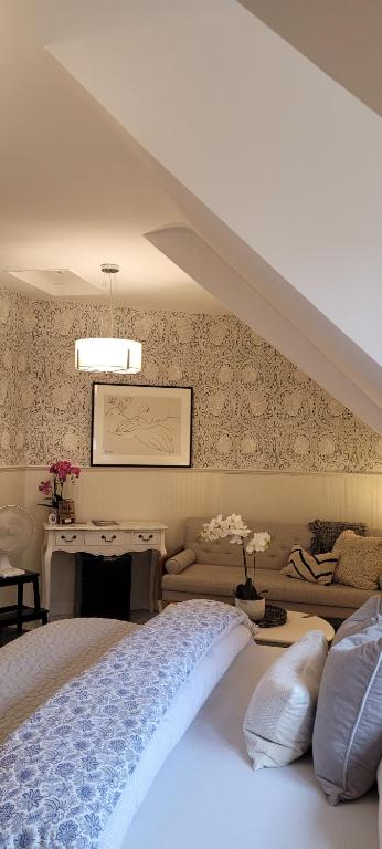 Postel nebo postele na pokoji v ubytování Rigsbys Guesthouse Doncaster