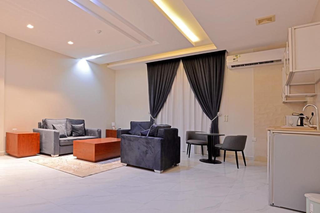 Posezení v ubytování شقق اجنحة كنزان للشقق المخدومة Knzan Suites