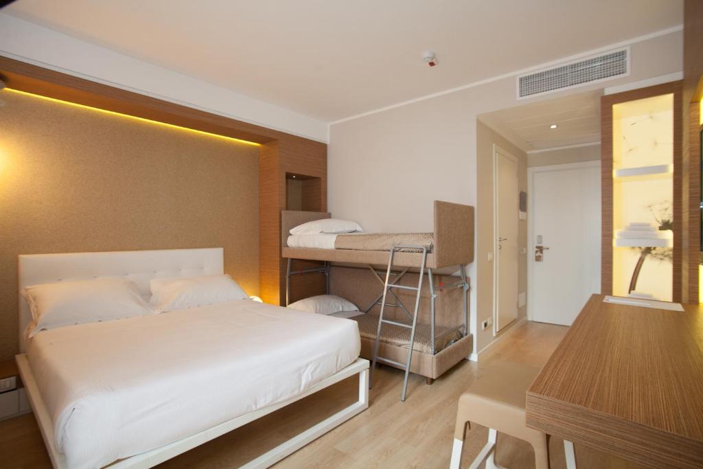 Postel nebo postele na pokoji v ubytování Oxygen Lifestyle Hotel