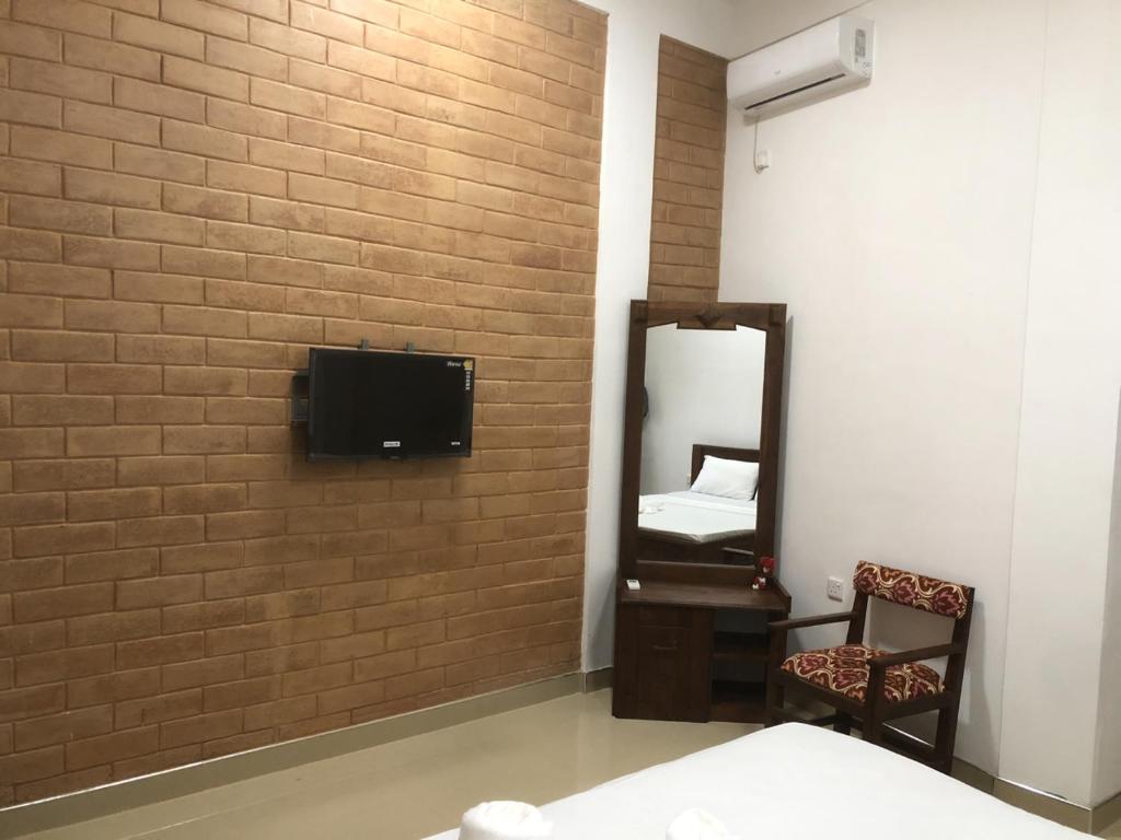 Koupelna v ubytování Hotel Varsha