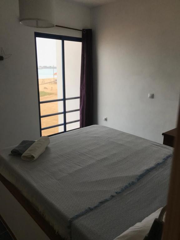 Postel nebo postele na pokoji v ubytování Beach Rotxa