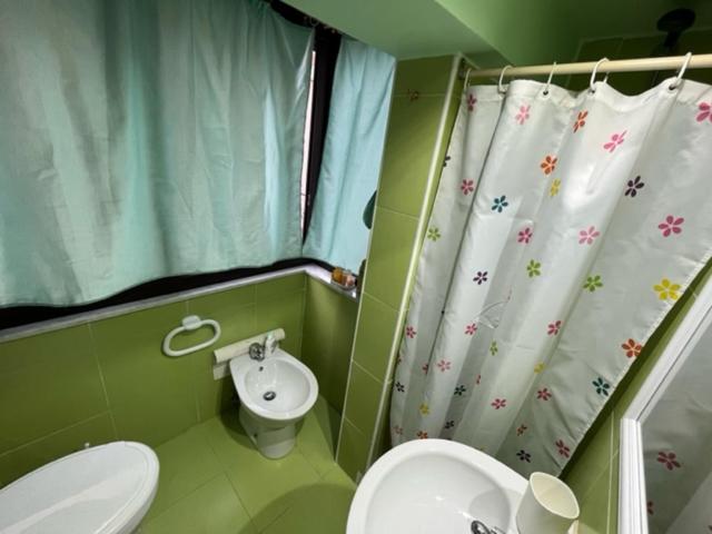 Koupelna v ubytování Holiday Gole Alcantara Graniti Room