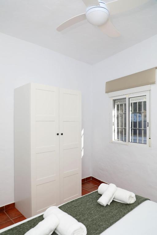Łóżko lub łóżka w pokoju w obiekcie Casa La Herradura 1