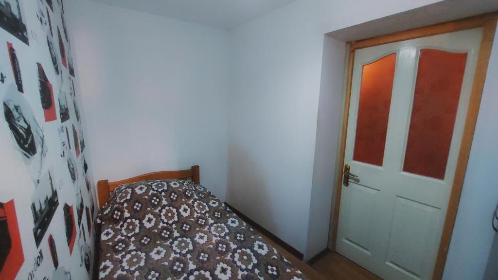 Postel nebo postele na pokoji v ubytování Buddha apartment