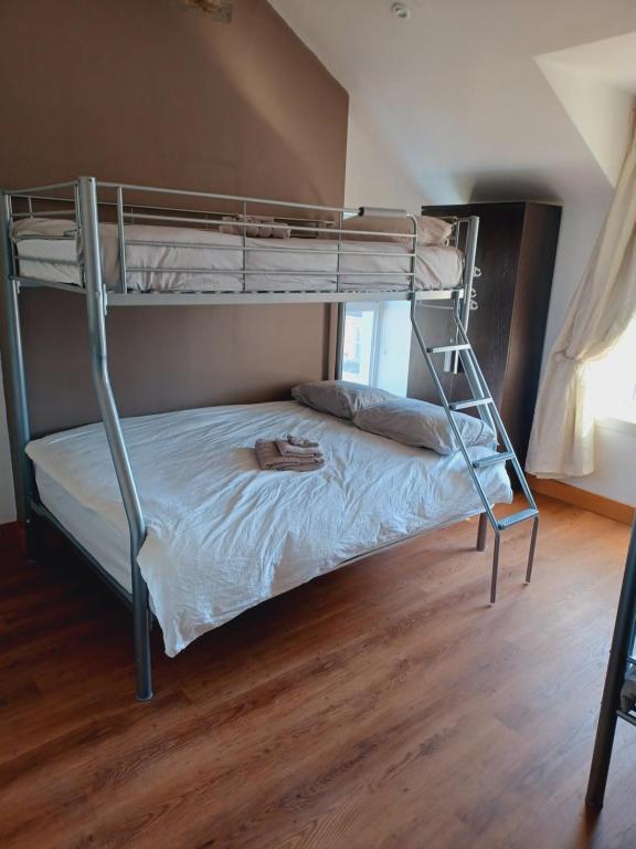 Postel nebo postele na pokoji v ubytování Voyage Hostel - Ensuite Family Rooms with shared kitchen