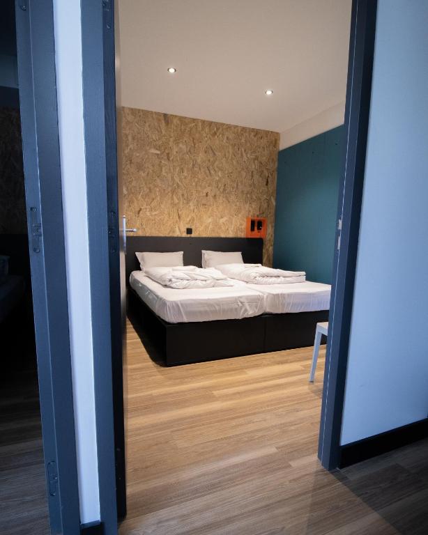 Postel nebo postele na pokoji v ubytování Moontain Hostel