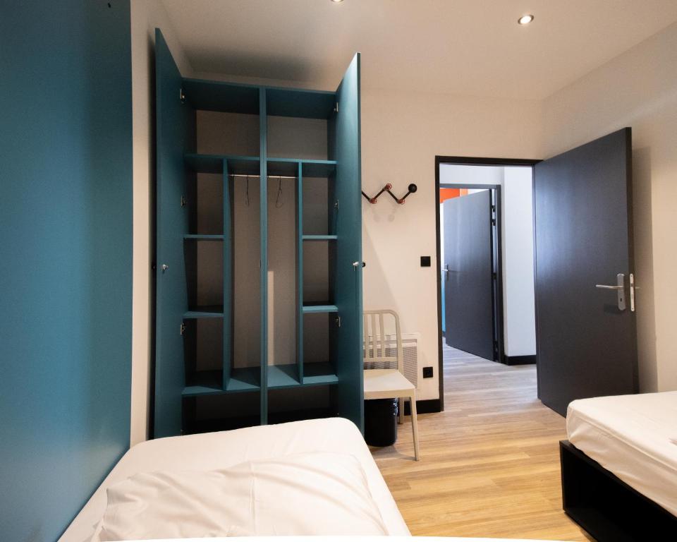 Postel nebo postele na pokoji v ubytování Moontain Hostel