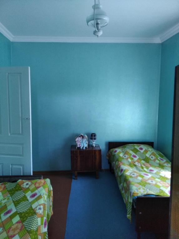 Postel nebo postele na pokoji v ubytování Roin Guest House