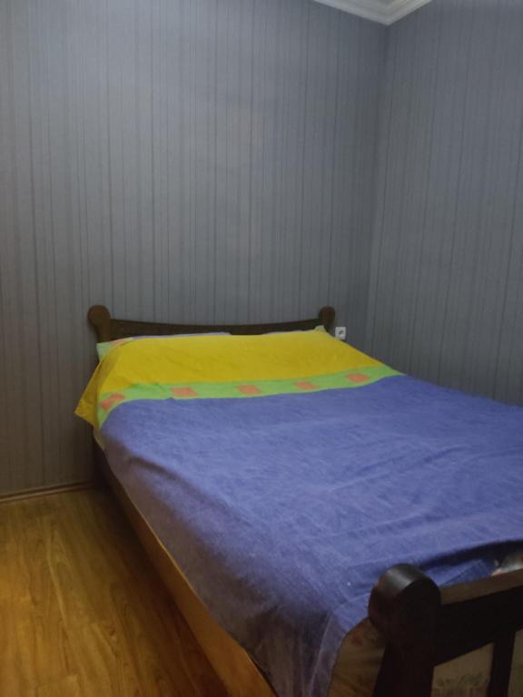 Postel nebo postele na pokoji v ubytování GNG Guest House