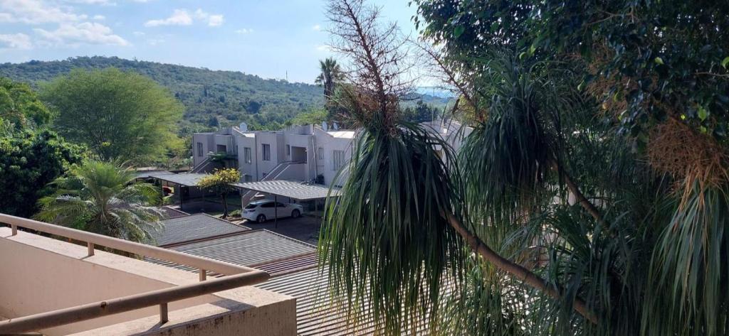 a view of a house from the balcony of a house at HomeSweetHome City Apartment in Nelspruit