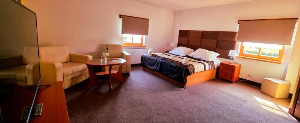 Posteľ alebo postele v izbe v ubytovaní Hotel Karczma u Macieja