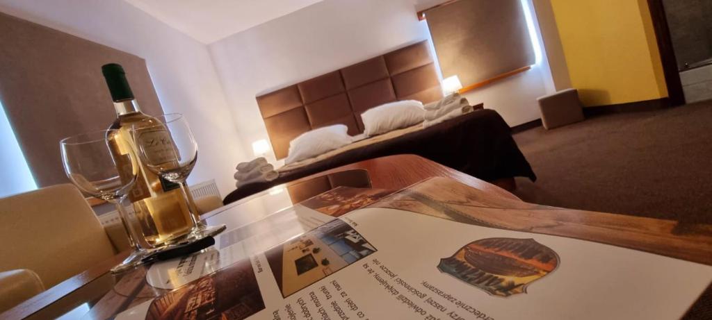 Posteľ alebo postele v izbe v ubytovaní Hotel Karczma u Macieja