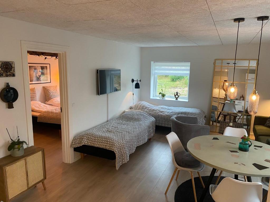 Postel nebo postele na pokoji v ubytování Motel Hune Apartments