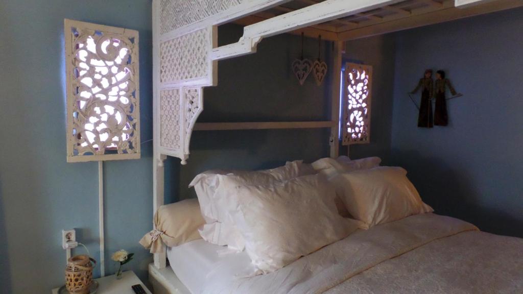 Postel nebo postele na pokoji v ubytování B&B de Valkenhorst