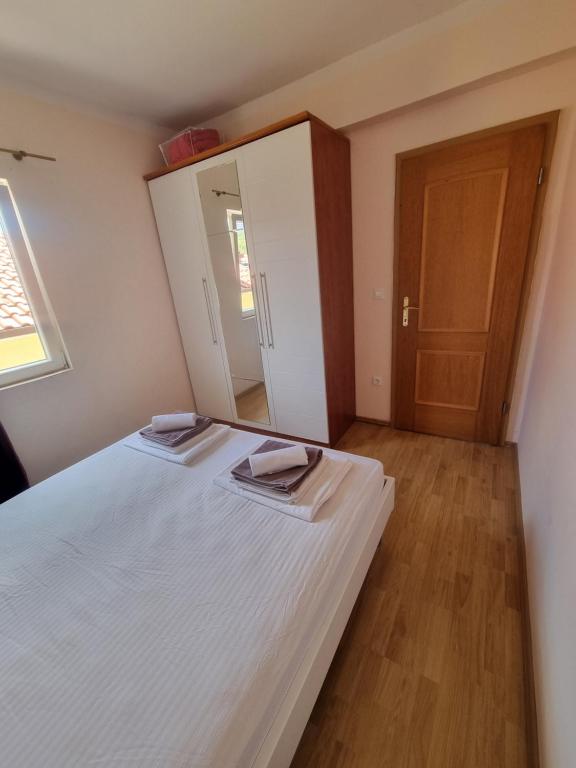 Posteľ alebo postele v izbe v ubytovaní Euromodus apartmani