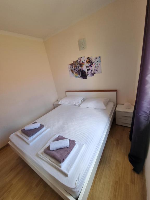 Posteľ alebo postele v izbe v ubytovaní Euromodus apartmani