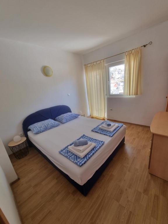 Posteľ alebo postele v izbe v ubytovaní Euromodus apartmani